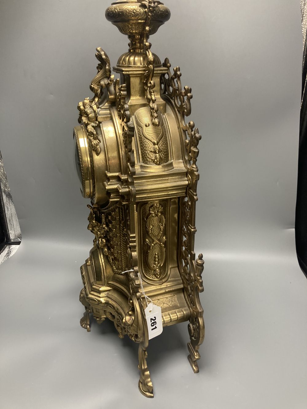 A large 20th century German brass mantel clock, 61cm